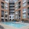 Resort-style swimming pool with lounge seating