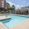Resort-style swimming pool with lounge seating