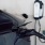 car being charged at EV charging station in parking garage