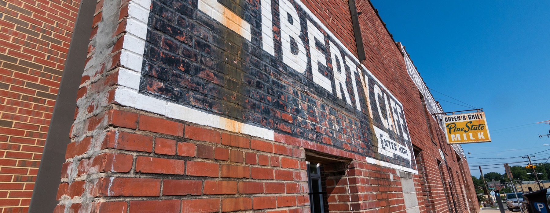 brick building with sign on side
