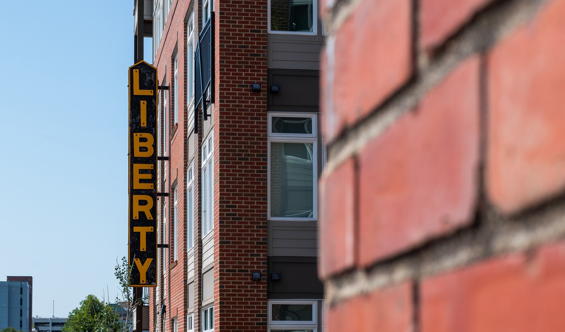 brick building with liberty sign